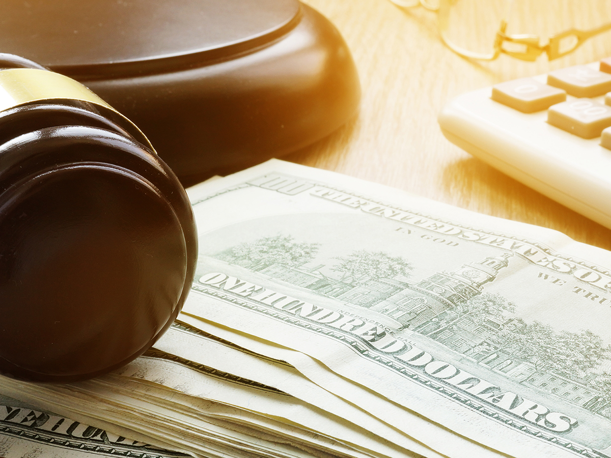 stack of money and gavel