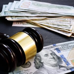 Gavel on dollar bills