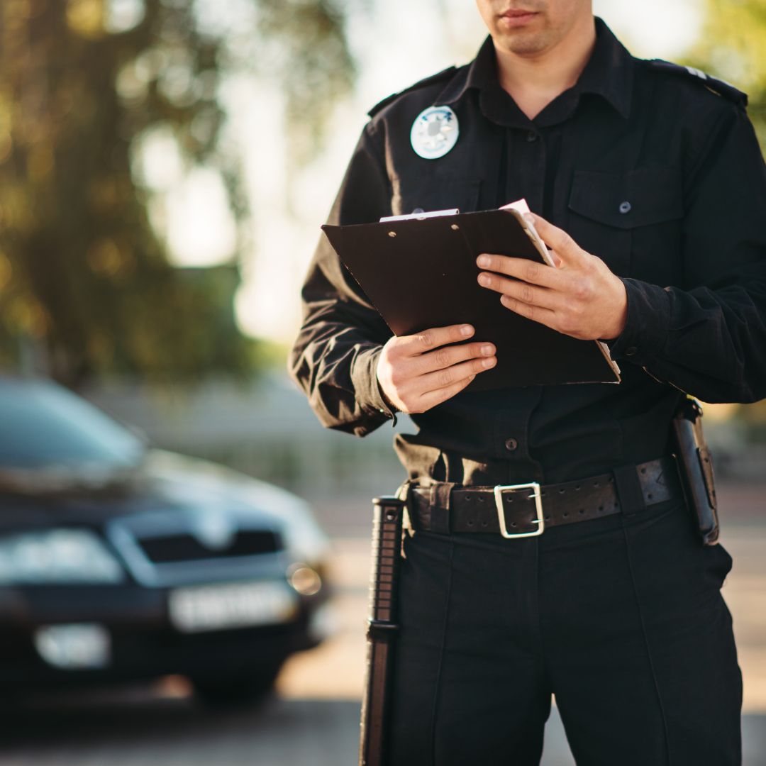 Police officer writing a ticket